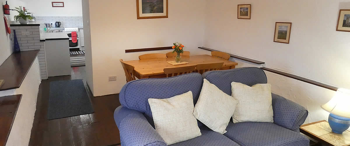 Open plan lounge, dining area and kitchen in The Byre holiday cottage