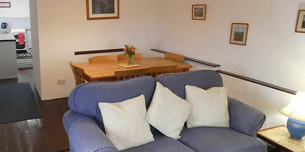 The Byre Holiday Cottage, open plan lounge, dining area and kitchen
